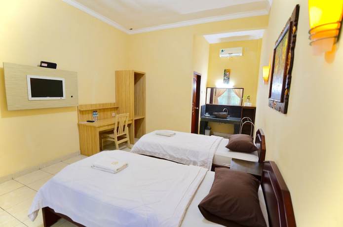 Imagen de la habitación del Hotel Transit Inn Senggigi. Foto 7