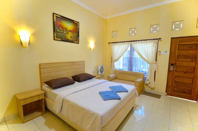 Imagen de la habitación del Hotel Transit Inn Senggigi. Foto 11