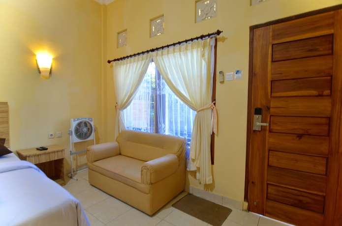Imagen de la habitación del Hotel Transit Inn Senggigi. Foto 14