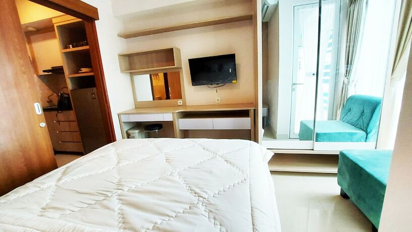 Imagen de la habitación del Hotel Transpark Juanda by 21 Room. Foto 12