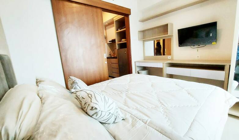 Imagen de la habitación del Hotel Transpark Juanda by 21 Room. Foto 15