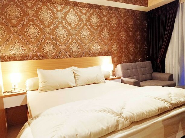 Imagen de la habitación del Hotel Transpark Juanda by 21 Room. Foto 20