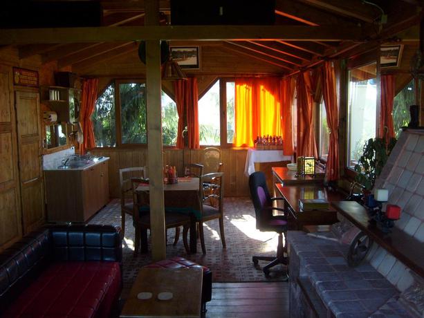 Imagen de los interiores del Hotel Transylvania Cowboy Cottage. Foto 4
