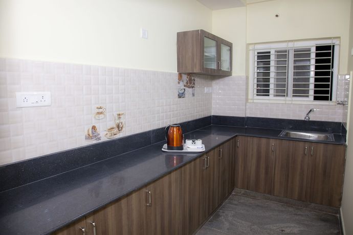 Imagen de la habitación del Hotel Tranzotel Bangalore Airport. Foto 16