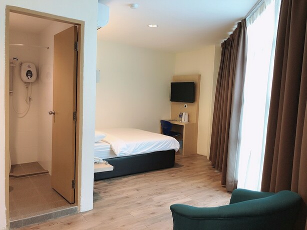 Imagen de la habitación del Hotel Tras Mutiara Bentong. Foto 23