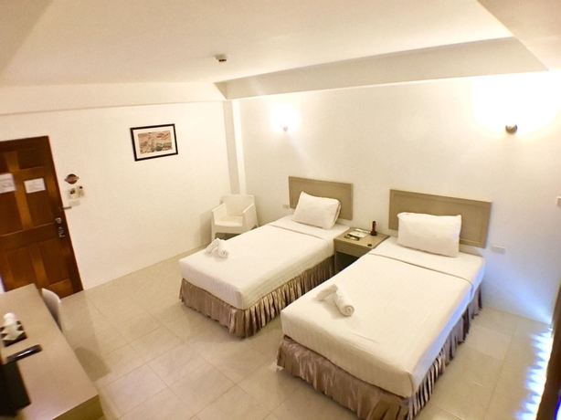 Imagen de la habitación del Hotel Trat Center. Foto 8