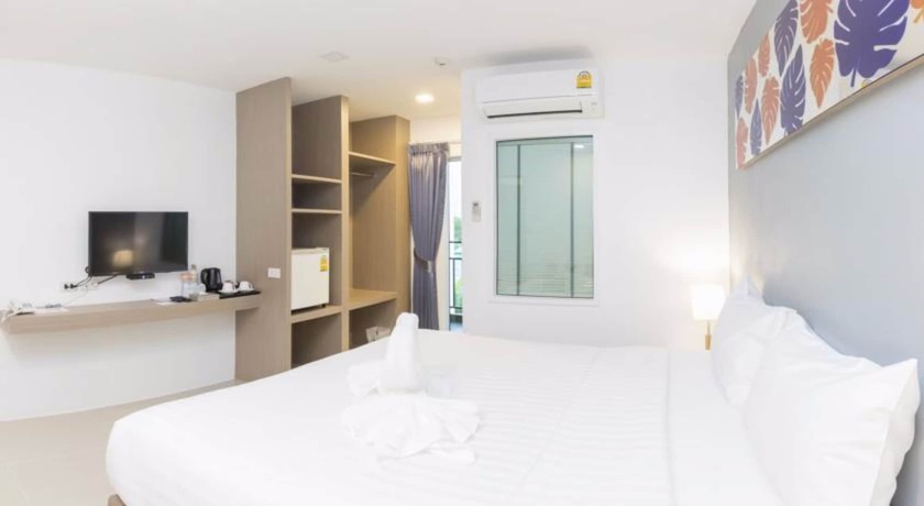 Imagen de la habitación del Hotel Trat City. Foto 10