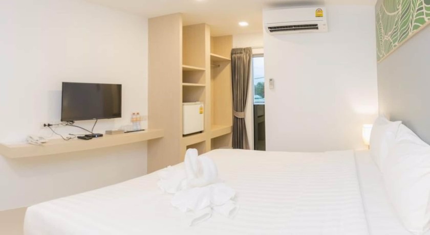 Imagen de la habitación del Hotel Trat City. Foto 12