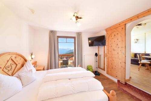 Imagen de la habitación del Hotel Tratterhof - Mountain Sky. Foto 9
