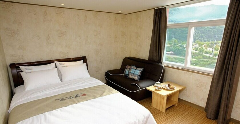 Imagen de la habitación del Hotel Traum and Condo. Foto 16