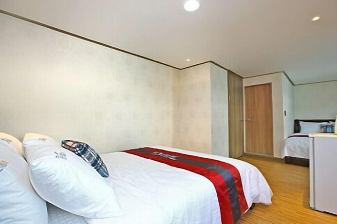 Imagen de la habitación del Hotel Traum and Condo. Foto 19