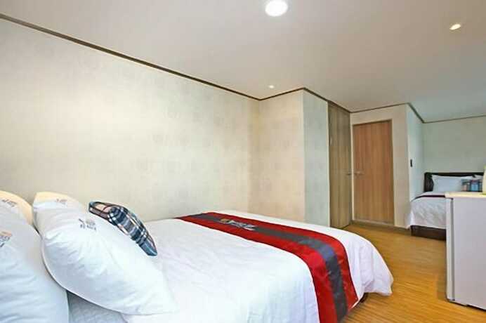 Imagen de la habitación del Hotel Traum and Condo. Foto 21