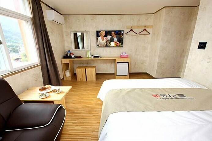 Imagen de la habitación del Hotel Traum and Condo. Foto 29