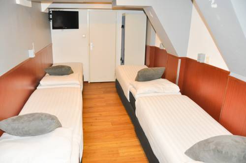 Imagen de la habitación del Hotel Travel Amsterdam. Foto 12