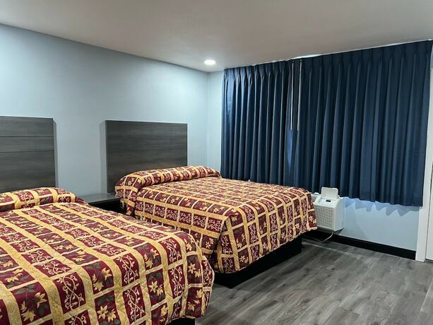 Imagen de la habitación del Hotel Travel Inn Gilroy. Foto 19
