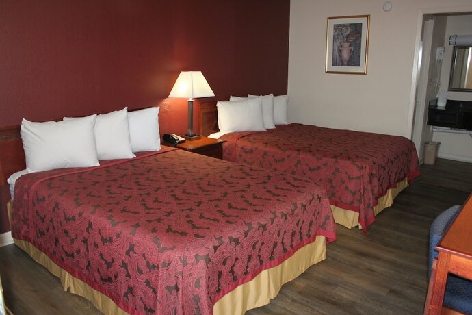Imagen de la habitación del Hotel Travel Inn of Buford. Foto 15