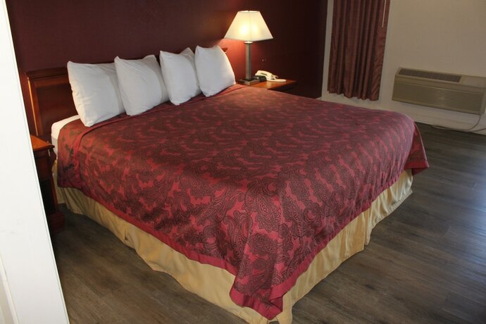 Imagen de la habitación del Hotel Travel Inn of Buford. Foto 16
