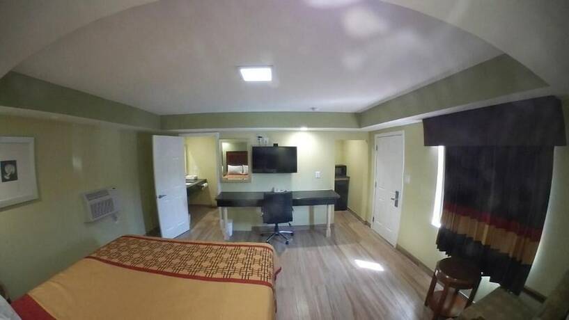 Imagen de la habitación del Hotel Travel Inn of Riviera Beach. Foto 8