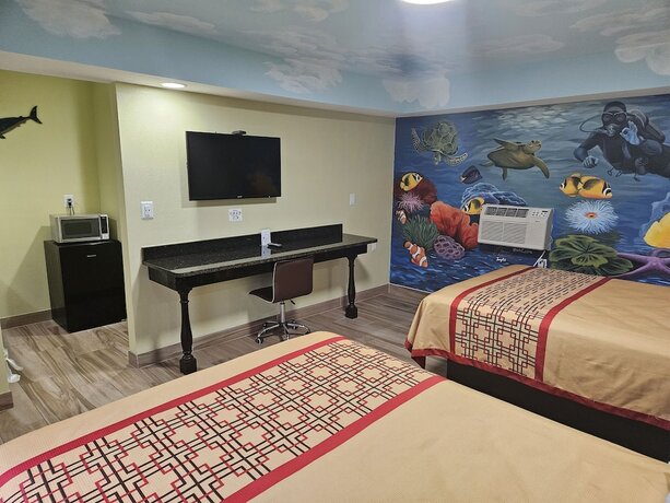Imagen de la habitación del Hotel Travel Inn of Riviera Beach. Foto 10