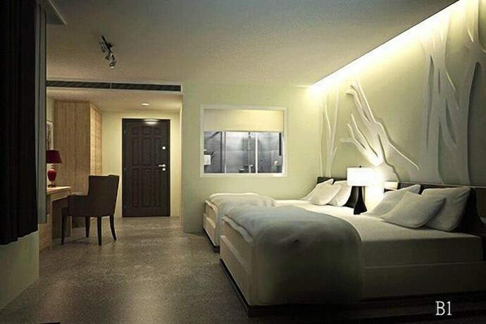 Imagen de la habitación del Hotel Travel Light Hotel. Foto 17