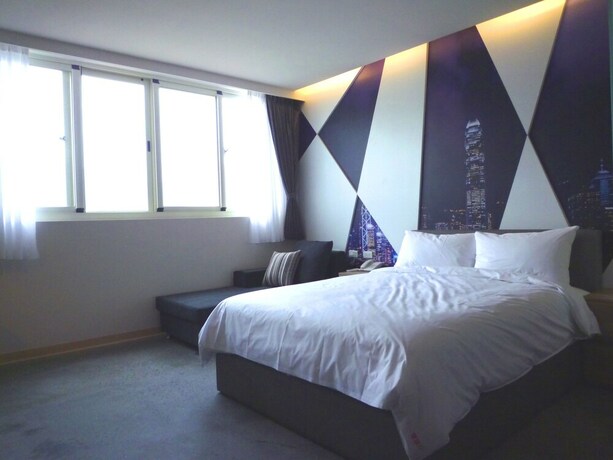 Imagen de la habitación del Hotel Travel Light Hotel. Foto 25