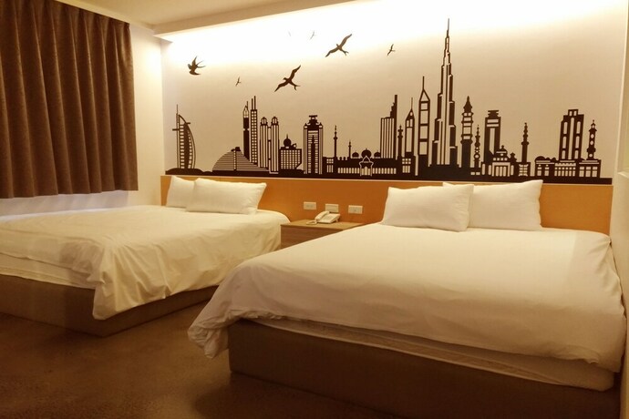 Imagen de la habitación del Hotel Travel Light Hotel. Foto 26