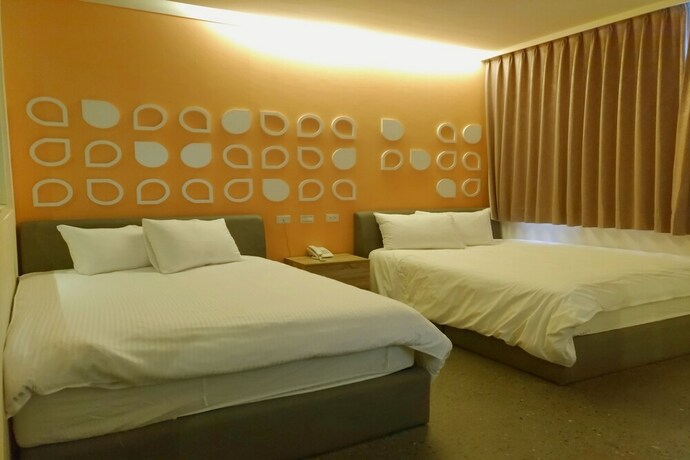 Imagen de la habitación del Hotel Travel Light Hotel. Foto 30