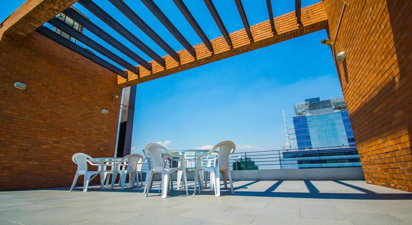 Imagen de los interiores del Hotel Travel Suites, Providencia. Foto 8