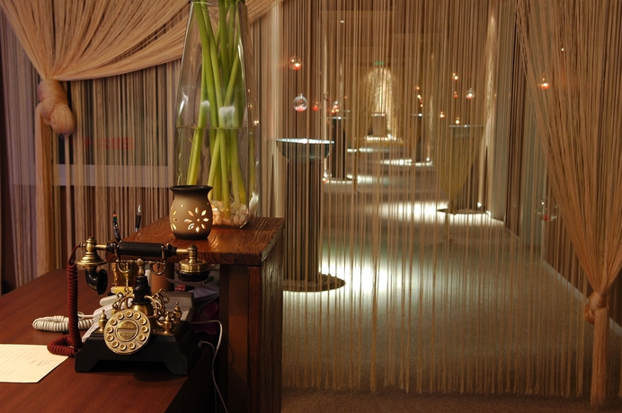 Imagen de los interiores del Hotel Traveler Inn Huaqiao Beijing. Foto 10