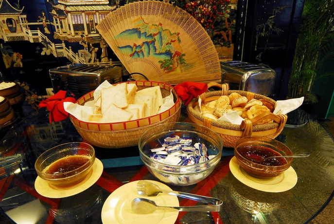 Imagen del bar/restaurante del Hotel Traveler Inn Huaqiao Beijing. Foto 3