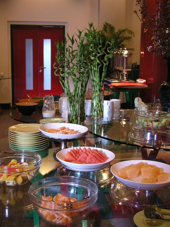 Imagen del bar/restaurante del Hotel Traveler Inn Huaqiao Beijing. Foto 6