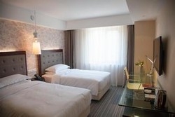 Imagen de la habitación del Hotel Traveler Inn-hepingli. Foto 2