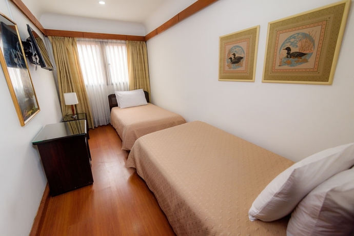 Imagen de la habitación del Hotel Travelers Condominio Plenitud. Foto 18