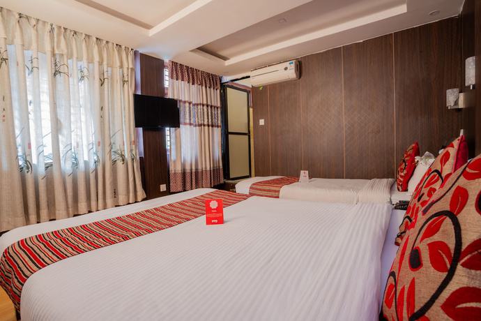 Imagen de la habitación del Hotel Traveler\'s Holiday Inn. Foto 8