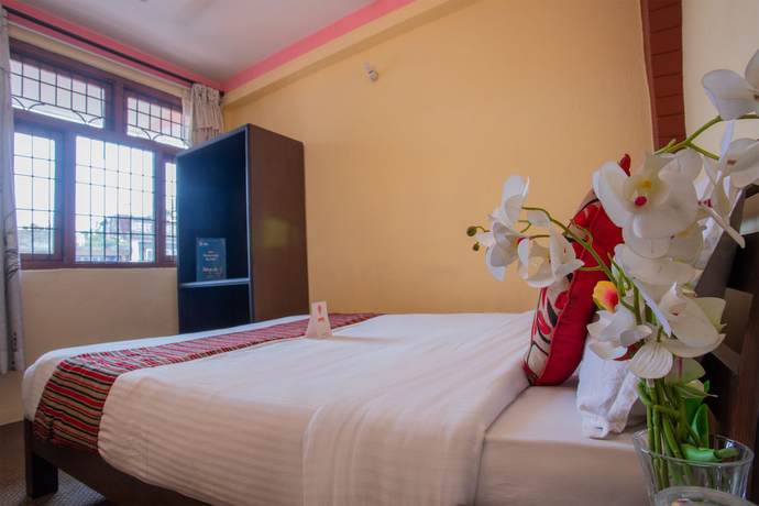 Imagen de la habitación del Hotel Traveler\'s Holiday Inn. Foto 14