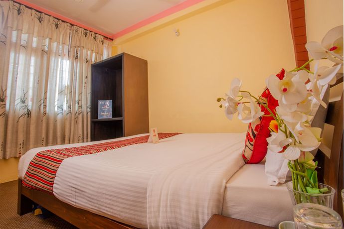 Imagen de la habitación del Hotel Traveler\'s Holiday Inn. Foto 16