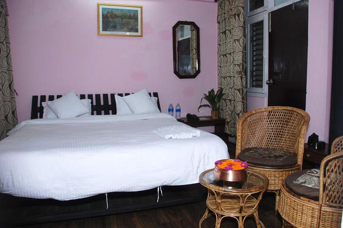 Imagen de la habitación del Hotel Travelers Home. Foto 3