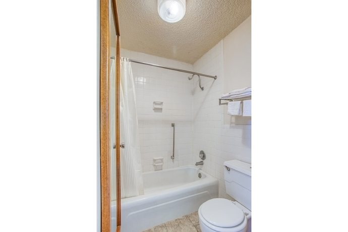Imagen de la habitación del Hotel Travelers Inn By OYO, Templeton VA. Foto 11