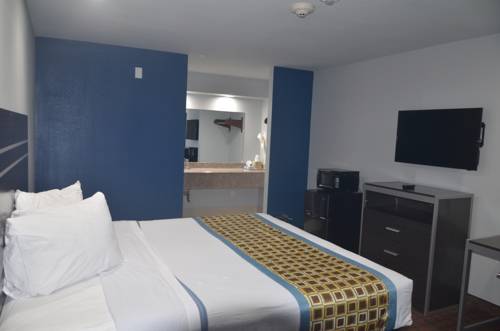 Imagen de la habitación del Hotel Traveler's Inn. Foto 8