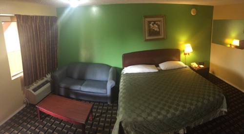 Imagen de la habitación del Hotel Traveler's Inn. Foto 10