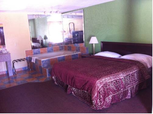 Imagen de la habitación del Hotel Traveler's Inn. Foto 11