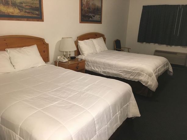 Imagen de la habitación del Hotel Traveler\'s Inn. Foto 10