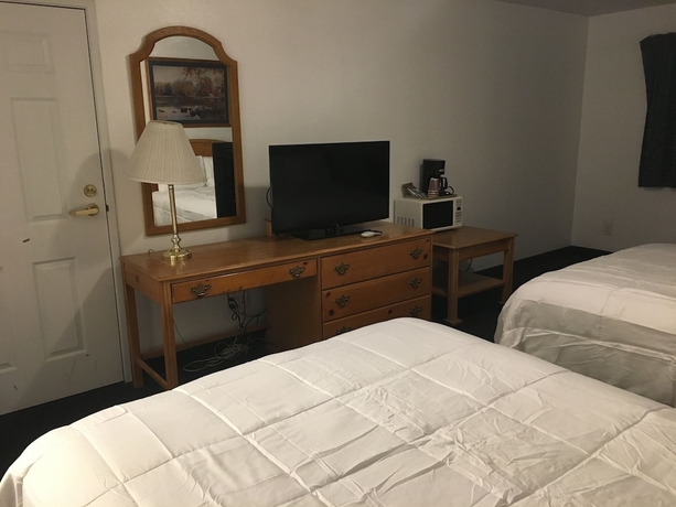 Imagen de la habitación del Hotel Traveler\'s Inn. Foto 12