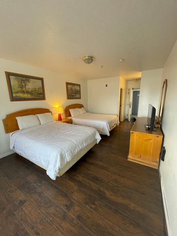 Imagen de la habitación del Hotel Traveler\'s Inn. Foto 13