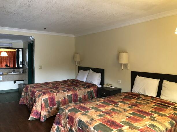 Imagen de la habitación del Hotel Travelers Inn, Lawndale. Foto 8
