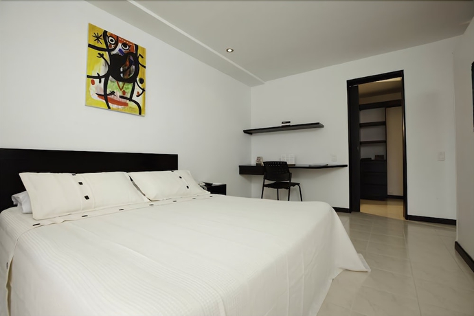 Imagen de la habitación del Hotel Travelers Orange Suites. Foto 4