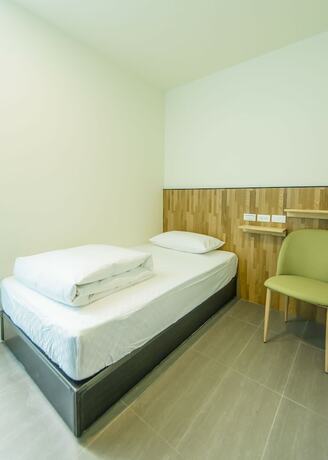 Imagen de la habitación del Hotel Travelers Plus - Hostel. Foto 13