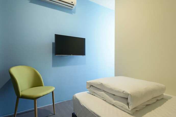 Imagen de la habitación del Hotel Travelers Plus - Hostel. Foto 14