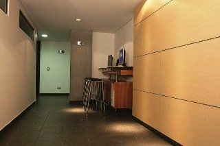 Imagen de los interiores del Hotel Travelers Suites Obelisco Apartamentos. Foto 7