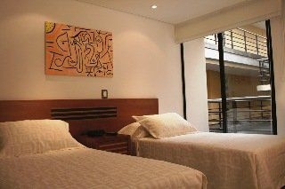 Imagen de la habitación del Hotel Travelers Suites Obelisco Apartamentos. Foto 5